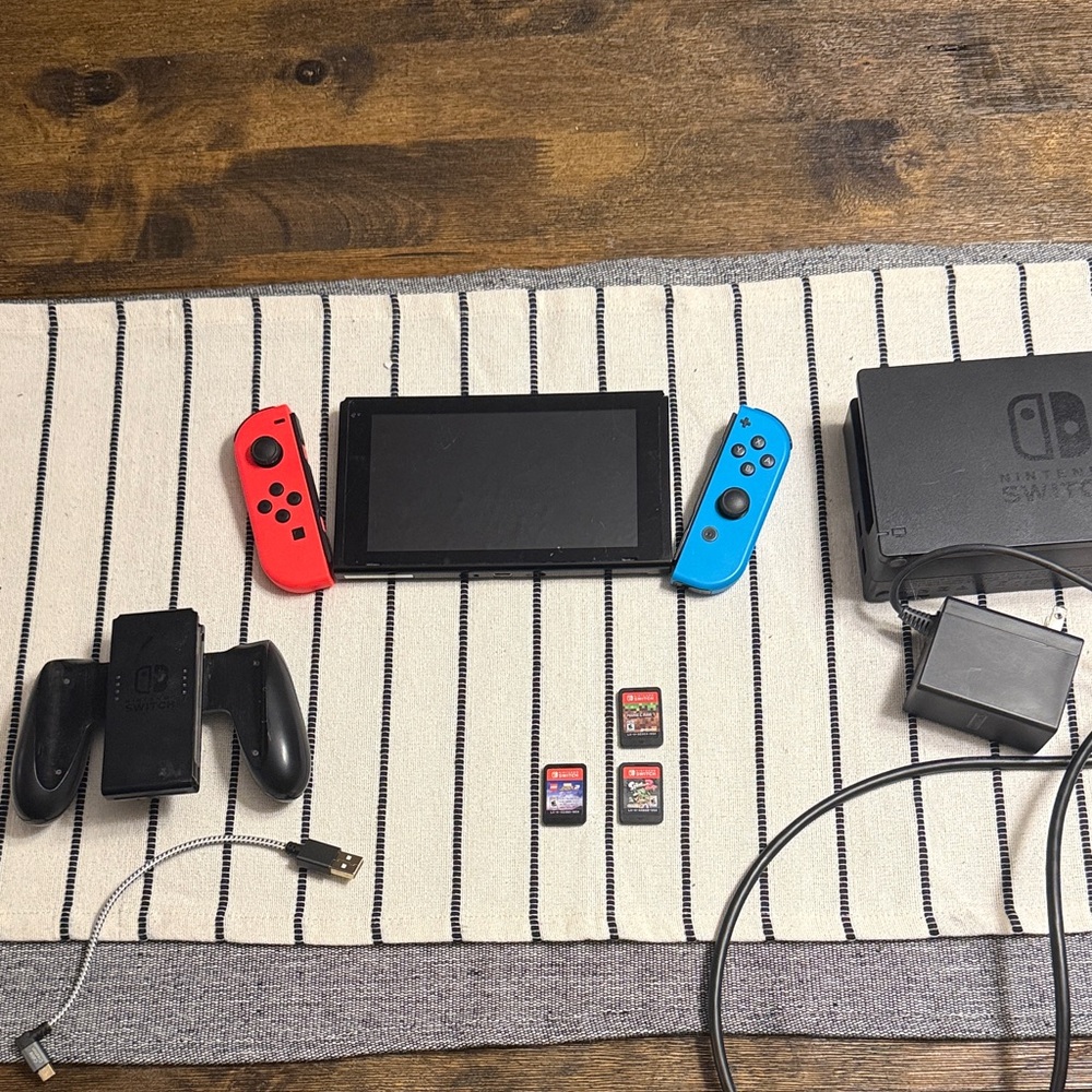 Nintendo Switch Console with Red and Blue Joy-Cons with 3 games
